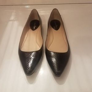 Calvin Klein black leather flats
